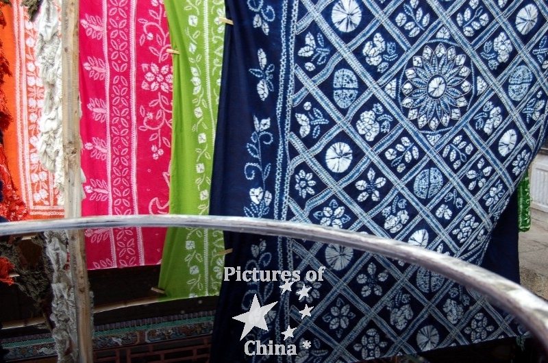 Yunnan fabrics in water reflection