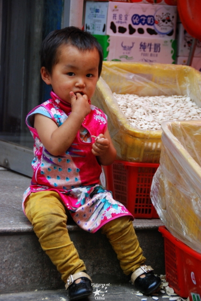 Little girl and her peanuts