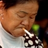 Kunming : Woman with a cigarette