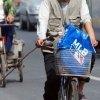Beijing : Bicycle among cars